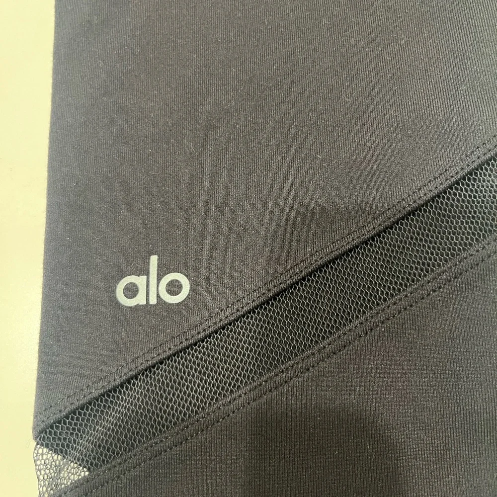 ALO Yoga Black Leggings with Mesh Detail - Picture 2 of 3
